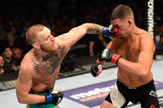 LAS VEGAS, NV - AUGUST 20: Nate Diaz fights Conor McGregor of Ireland in their welterweight bout during the UFC 202 event at T-Mobile Arena on August 20, 2016 in Las Vegas, Nevada. (Photo by Josh Hedges/Zuffa LLC/Zuffa LLC via Getty Images)