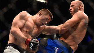 AUGUST 20: Rick Story fights Donald Cerrone in their welterweight bout during the UFC 202 event at T-Mobile Arena on August 20, 2016 in Las Vegas, Nevada. (Photo by Jeff Bottari/Zuffa LLC/Zuffa LLC via Getty Images)