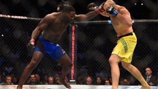 AUGUST 20: Anthony Johnson fights Glover Teixeira of Brazil in their light heavyweight bout during the UFC 202 event at T-Mobile Arena on August 20, 2016 in Las Vegas, Nevada. (Photo by Jeff Bottari/Zuffa LLC/Zuffa LLC via Getty Images)