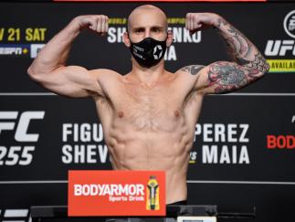 Sasha Palatnikov poses on the scale during the UFC 255