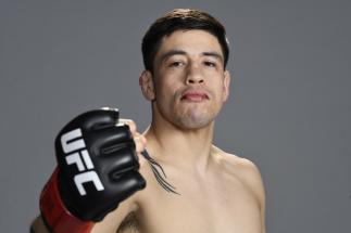 Brandon Moreno of Mexico poses for a portrait backstage during the UFC 255