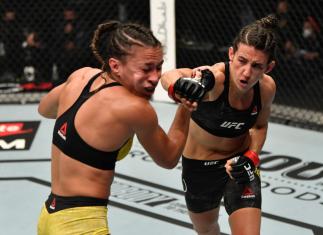 ABU DHABI, UNITED ARAB EMIRATES - JANUARY 23: (R-L) Marina Rodriguez of Brazil punches Amanda Ribas of Brazil in a strawweight fight during the UFC 257