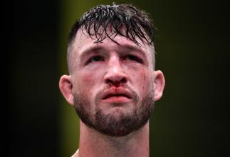 Julian Erosa celebrates after his submission victory over Sean Woodson in their fight during the UFC Fight Night event at UFC APEX on June 27, 2020 in Las Vegas, Nevada. (Photo by Chris Unger/Zuffa LLC)
