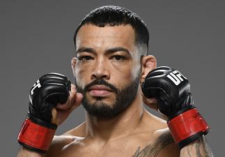 Dan Ige poses for a portrait after his victory during the UFC Fight Night event at UFC APEX