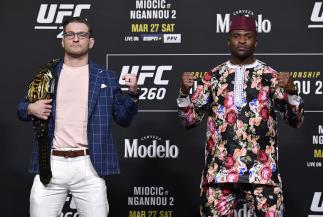 LAS VEGAS, NEVADA - MARCH 25: (L-R) Opponents Stipe Miocic and Francis Ngannou of Cameroon pose for photos during the UFC 260
