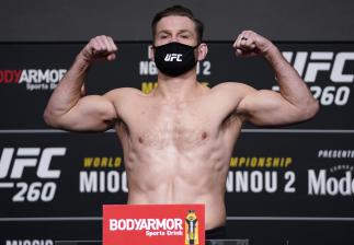 LAS VEGAS, NEVADA - MARCH 26: Stipe Miocic poses on the scale during the UFC 260
