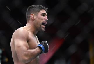 LAS VEGAS, NEVADA - MARCH 27: Vicente Luque reacts after his victory over Tyron Woodley in their welterweight fight during the UFC 260 e