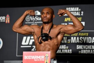 JACKSONVILLE, FLORIDA - APRIL 23: Kamaru Usman of Nigeria poses on the scale during the official UFC 261