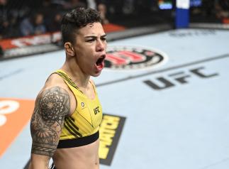 LAS VEGAS, NEVADA - SEPTEMBER 25: Jessica Andrade of Brazil celebrates her win over Cynthia Calvillo in their flyweight fight during the UFC 266 event on September 25, 2021 in Las Vegas, Nevada