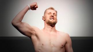 Alexander Volkov of Russia poses on the scale during the UFC Fight Night ceremonial weigh-in at O2 Arena on March 18, 2022 in London, England. (Photo by Chris Unger/Zuffa LLC)