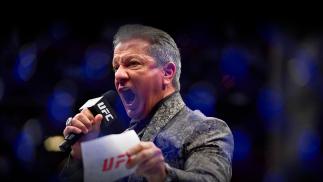 UFC Octagon Announcer Bruce Buffer introduces Anderson dos Santos of Brazil prior to his bantamweight bout during the UFC 265 event at Toyota Center on August 07, 2021 in Houston, Texas. (Photo by Cooper Neill/Zuffa LLC)