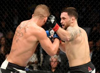 NEW YORK, NY - NOVEMBER 12: Jeremy Stephens of the United States (left) fights against Frankie Edgar of the United States in their featherweight bout during the UFC 205 event at Madison Square Garden on November 12, 2016 in New York City. (Photo by Jeff