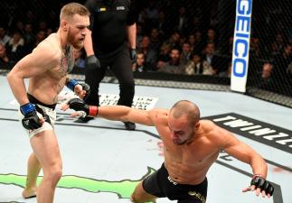 NEW YORK, NY - NOVEMBER 12: Eddie Alvarez of the United States (right) fights against Conor McGregor of Ireland in their lightweight championship bout during the UFC 205 event at Madison Square Garden on November 12, 2016 in New York City. (Photo by Jef