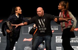 NEW YORK, NY - NOVEMBER 10: (L-R) Opponents Joanna Jedrzejczyk of Poland and Karolina Kowalkiewicz of Poland face off during the UFC 205 press conference inside The Theater at Madison Square Garden on November 10, 2016 in New York City. (Photo by Jeff Bo