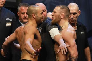 NEW YORK, NY - NOVEMBER 11: UFC president Dana White seperates UFC Featherweight Champion Conor McGregor of Ireland (R) and UFC Lightweight Champion Eddie Alvarez during UFC 205 Weigh-ins at Madison Square Garden on November 11, 2016 in New York City. (