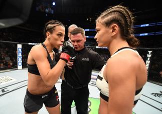 NEW YORK, NY - NOVEMBER 12: Karolina Kowalkiewicz of Poland (right) fights against Joanna Jedrzejczyk of Poland in their women's strawweight championship bout during the UFC 205 event at Madison Square Garden on November 12, 2016 in New York City. (Photo