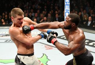 NEW YORK, NY - NOVEMBER 12: Tyron Woodley of the United States (left) fights against Stephen Thompson of the United States in their welterweight championship bout during the UFC 205 event at Madison Square Garden on November 12, 2016 in New York City. (