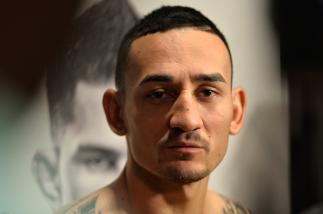 TORONTO, CANADA - DECEMBER 07: Max Holloway speaks to the media inside Massey Hall on December 7, 2016 in Toronto, Ontario, Canada. (Photo by Brandon Magnus/Zuffa LLC/Zuffa LLC via Getty Images)