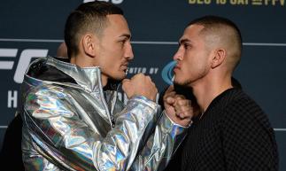 TORONTO, CANADA - DECEMBER 08: (L-R) Max Holloway and Anthony Pettis face off during the UFC 206 Ultimate Media Day event inside the Westin Harbour Castle Hotel on December 8, 2016 in Toronto, Ontario, Canada. (Photo by Brandon Magnus/Zuffa LLC/Zuffa LLC