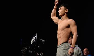 TORONTO, CANADA - DECEMBER 09: Dooho Choi of South Korea poses on the scale during the UFC 206 weigh-in inside the Air Canada Centre on December 9, 2016 in Toronto, Ontario, Canada. (Photo by Brandon Magnus/Zuffa LLC/Zuffa LLC via Getty Images)