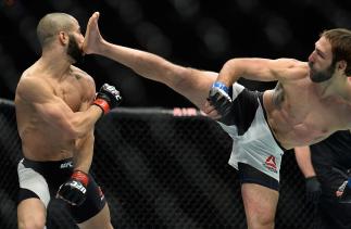 TORONTO, CANADA - DECEMBER 10: (R-L) Lando Vannata kicks John Makdessi of Canada in their lightweight bout during the UFC 206 event inside the Air Canada Centre on December 10, 2016 in Toronto, Ontario, Canada. (Photo by Brandon Magnus/Zuffa LLC/Zuffa LL