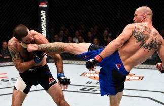 TORONTO, CANADA - DECEMBER 10: (L-R) Donald Cerrone knocks out Matt Brown with a kick to the head in their welterweight bout during the UFC 206 event inside the Air Canada Centre on December 10, 2016 in Toronto, Ontario, Canada. (Photo by Jeff Bottari/Zu