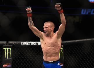 LAS VEGAS, NV - DECEMBER 30: TJ Dillashaw reacts to his victory over John Lineker of Brazil in their bantamweight bout during the UFC 207 event at T-Mobile Arena on December 30, 2016 in Las Vegas, Nevada. (Photo by Jeff Bottari/Zuffa LLC/Zuffa LLC via G