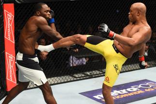BROOKLYN, NEW YORK - FEBRUARY 11: (R-L) Anderson Silva of Brazil kicks Derek Brunson in their middleweight bout during the UFC 208 event inside Barclays Center on February 11, 2017 in Brooklyn, New York. (Photo by Jeff Bottari/Zuffa LLC/Zuffa LLC via Get