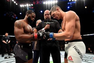 NEW YORK, NY - NOVEMBER 12: Tyrone Wodley (left) of the United States meets in the center of the octagon before fighting against Stephen Thompson of the United States in their welterweight championship bout during the UFC 205 event at Madison Square Gard