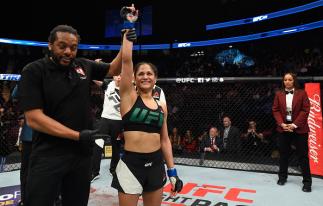 LAS VEGAS, NV - MARCH 04: Cynthia Calvillo reacts to her victory over Amanda Cooper in their women's strawweight bout during the UFC 209 event at T-Mobile Arena on March 4, 2017 in Las Vegas, Nevada. (Photo by Josh Hedges/Zuffa LLC/Zuffa LLC via Getty I