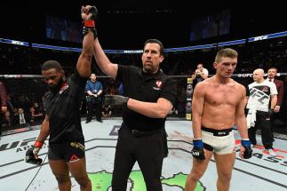 LAS VEGAS, NV - MARCH 04: Tyron Woodley (left) reacts to his victory over Stephen Thompson (right) in their UFC welterweight championship bout during the UFC 209 event at T-Mobile Arena on March 4, 2017 in Las Vegas, Nevada.  (Photo by Josh Hedges/Zuffa L