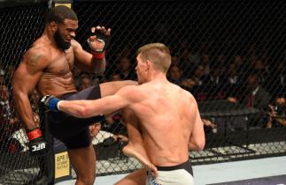 LAS VEGAS, NV - MARCH 04: (L-R) Tyron Woodley knees Stephen Thompson in their UFC welterweight championship bout during the UFC 209 event at T-Mobile Arena on March 4, 2017 in Las Vegas, Nevada. (Photo by Josh Hedges/Zuffa LLC/Zuffa LLC via Getty Images)