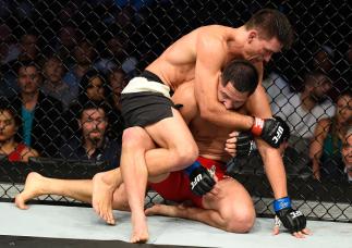 DALLAS, TX - MAY 13: (L-R) Demian Maia attempts to submit Jorge Masvidal in their welterweight fight during the UFC 211 event at the American Airlines Center on May 13, 2017 in Dallas, Texas. (Photo by Josh Hedges/Zuffa LLC/Zuffa LLC via Getty Images)