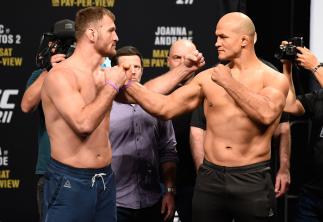 DALLAS, TX - MAY 12: (L-R) UFC heavyweight champion Stipe Miocic and Junior Dos Santos of Brazil face off during the UFC 211 weigh-in at the American Airlines Center on May 12, 2017 in Dallas, Texas. (Photo by Josh Hedges/Zuffa LLC/Zuffa LLC via Getty Im