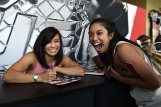 LAS VEGAS, NV - JULY 08: Michelle Waterson meets with fans during an autograph session at T-Mobile Arena on July 8, 2017 in Las Vegas, Nevada. (Photo by Brandon Magnus/Zuffa LLC)