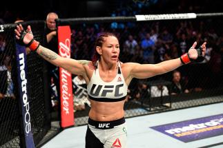 ANAHEIM, CA - JULY 29: Cris Cyborg of Brazil reacts after defeating Tonya Evinger by TKO in their UFC women's featherweight championship bout during the UFC 214 event at Honda Center on July 29, 2017 in Anaheim, California. (Photo by Josh Hedges/Zuffa L