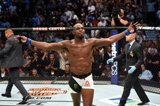 ANAHEIM, CA - JULY 29: Jon Jones celebrates after knocking out Daniel Cormier in their UFC light heavyweight championship bout during the UFC 214 event at Honda Center on July 29, 2017 in Anaheim, California. (Photo by Josh Hedges/Zuffa LLC/Zuffa LLC vi