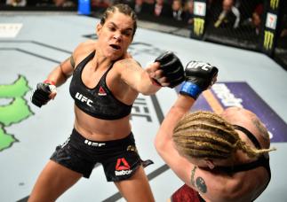 EDMONTON, AB - SEPTEMBER 09: (L-R) Amanda Nunes of Brazil punches Valentina Shevchenko of Kyrgyzstan in their women's bantamweight bout during the UFC 215 event inside the Rogers Place on September 9, 2017 in Edmonton, Alberta, Canada. (Photo by Jeff Bot