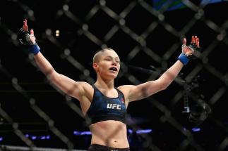 NEW YORK, NY - NOVEMBER 04: Rose Namajunas
celebrates her victory over Joanna Jedrzejczyk of Poland in their UFC women's strawweight championship bout during the UFC 217 event at Madison Square Garden on November 4, 2017 in New York City. (Photo by Mike