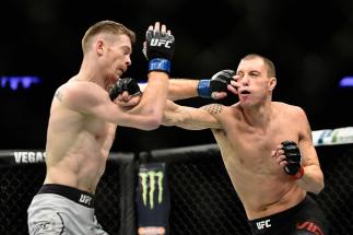 NEW YORK, NY - NOVEMBER 04: James Vick lands a punch against Joe Duffy of Ireland in their lightweight bout during the UFC 217 event at Madison Square Garden on November 4, 2017 in New York City. (Photo by Jeff Bottari/Zuffa LLC)