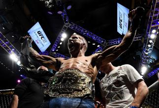 NEW YORK, NY - NOVEMBER 04: TJ Dillashaw celebrates his knockout victory over Cody Garbrandt in their UFC bantamweight championship bout during the UFC 217 event inside Madison Square Garden on November 4, 2017 in New York City. (Photo by Brandon Magnus/