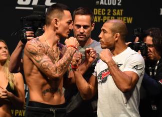 DETROIT, MI - DECEMBER 01: (L-R) Max Holloway and Jose Aldo of Brazil face off during the UFC 218 weigh-in inside Little Caesars Arena on December 1, 2017 in Detroit, Michigan. (Photo by Josh Hedges/Zuffa LLC/Zuffa LLC via Getty Images)