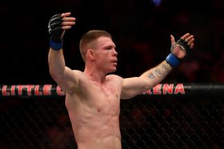 7DETROIT, MI - DECEMBER 02: Paul Felder celebrates his victory over Charles Oliveira during UFC 218 at Little Ceasars Arena on December 2, 2018 in Detroit, Michigan. (Photo by Gregory Shamus/Getty Images)