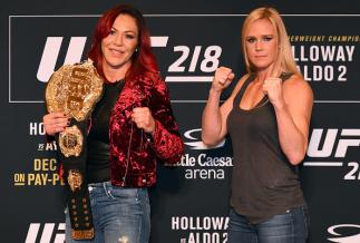 DETROIT, MI - NOVEMBER 30: (L-R) Opponents Cris Cyborg of Brazil and Holly Holm pose for photos ahead of their UFC 219 fight during the UFC 218 Ultimate Media Day at the DoubleTree Hotel on November 30, 2017 in Detroit, Michigan. (Photo by Josh Hedges/Zu