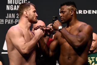 BOSTON, MA - JANUARY 19: (L-R) Stipe Miocic and Francis Ngannou of Cameroon face off during the UFC 220 weigh-in at TD Garden on January 19, 2018 in Boston, Massachusetts. (Photo by Jeff Bottari/Zuffa LLC/Zuffa LLC via Getty Images)