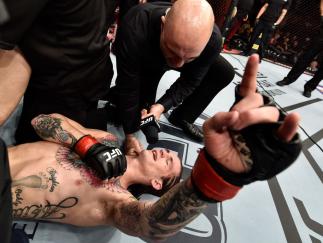 LAS VEGAS, NV - MARCH 03: Sean O'Malley is interviewed by Joe Rogan after his unanimous-decision victory over Andre Soukhamthath in their bantamweight bout during the UFC 222 event inside T-Mobile Arena on March 3, 2018 in Las Vegas, Nevada. (Photo by J