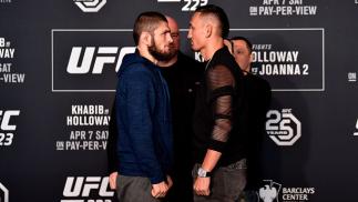 BROOKLYN, NY - APRIL 05: (L-R) Khabib Nurmagomedov of Russia and Max Holloway face off during the UFC 223 Ultimate Media Day inside Barclays Center on April 5, 2018 in Brooklyn, New York. (Photo by Jeff Bottari/Zuffa LLC/Zuffa LLC via Getty Images)