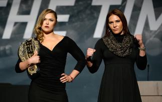 LAS VEGAS, NEVADA - NOVEMBER 17: UFC women's bantamweight champion Ronda Rousey (L) and challenger Cat Zingano pose for the media during the UFC Time Is Now press conference at The Smith Center for the Performing Arts on November 17, 2014 in Las Vegas, N