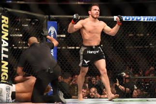 LOS ANGELES, CA - FEBRUARY 28: Jake Ellenberger celebrates his submission victory over Josh Koscheck in their welterweight bout during the UFC 184 event at Staples Center on February 28, 2015 in Los Angeles, California. (Photo by Harry How/Getty Images)