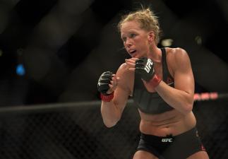 LAS VEGAS, NV - MARCH 5: (R-L) Holly Holm circles Miesha Tate during their women's bantamweight championship bout during the UFC 196 in the MGM Grand Garden Arena on March 5, 2016 in Las Vegas, Nevada. (Photo by Brandon Magnus/Zuffa LLC/Zuffa LLC via G